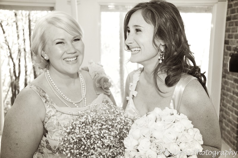 Sepia photo of bride with her bridesmaid - wedding photography sydney
